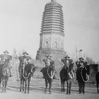 7 Chinese Gendarmes in peaked hats are mounted as skirmishes as cavalry in front of a temple