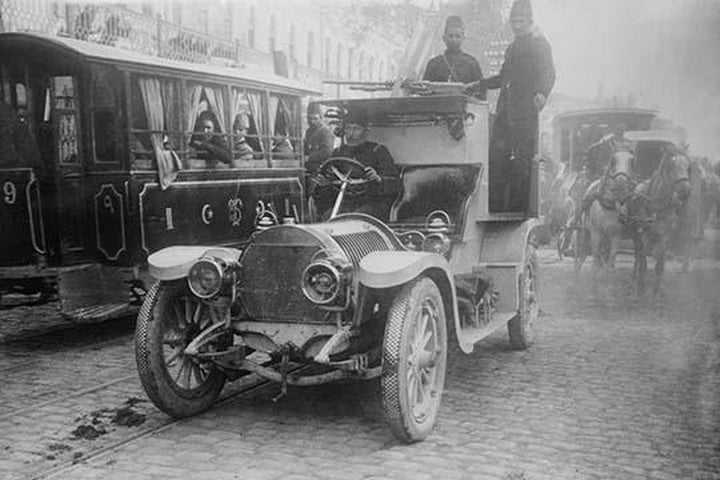 Armored Automobile juxtaposed with Trolley Car & Horse Team on a City Street in Turkey