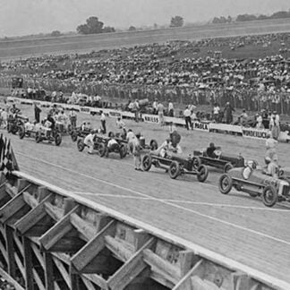 Auto Racers at Speedway Line Up at Starting Line to Begin the Race