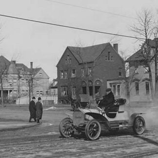 Auto Trundles down city street