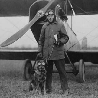 Aviator and His dog wear goggles in front of his Biplane
