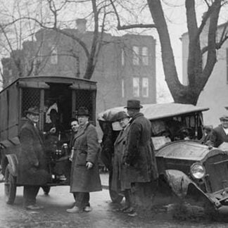 Bootleggers Carted off to Prison After their Car was Wrecked in a Police Chase