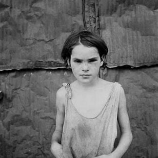 Child living in Oklahoma City shacktown by Dorothea Lange