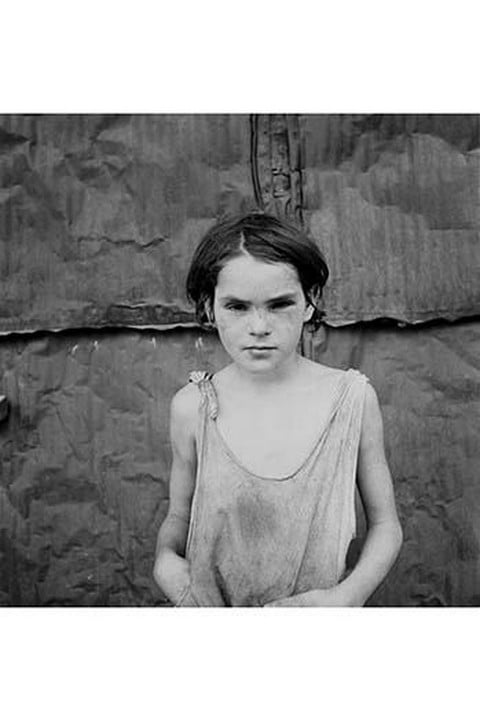Child living in Oklahoma City shacktown by Dorothea Lange
