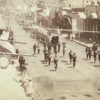 Deadwood Parade with Marching band by John C.H. Grabill
