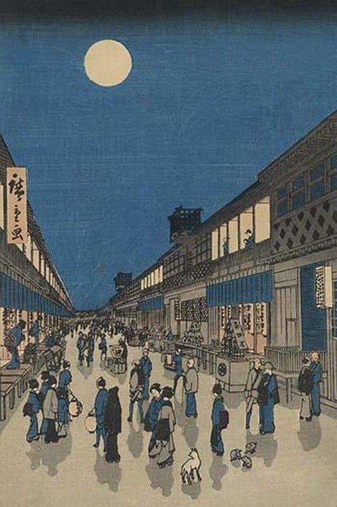 Full Moon Over a Crowded Street