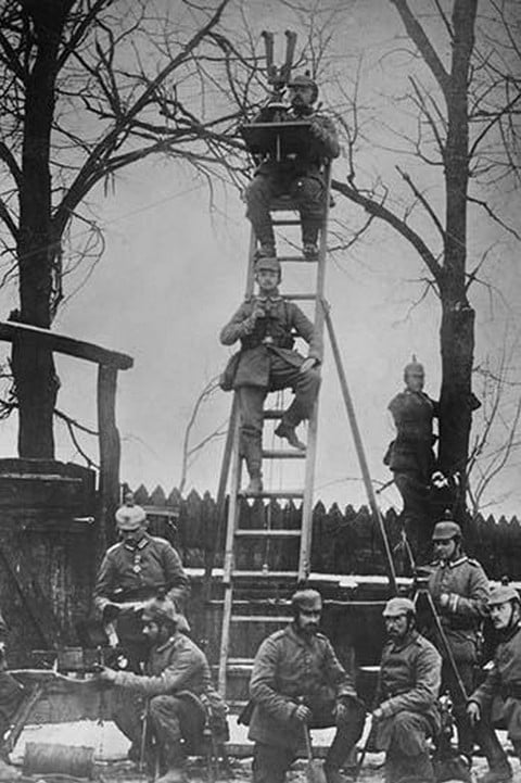 German Unit of Field Observers on ladders and with binoculars