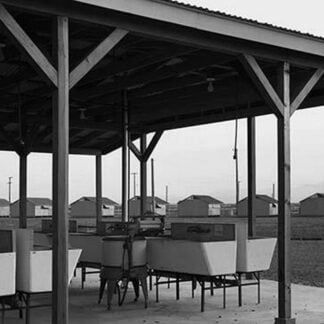 Laundry facilities at Westley camp by Dorothea Lange