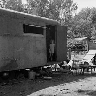 Little Girl in Hous Trailer by Dorothea Lange