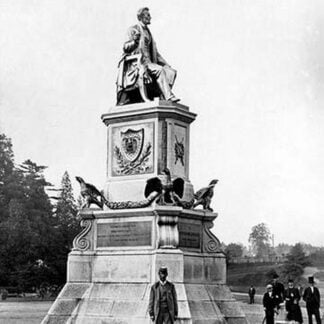 Man Standing in Front of Lincoln Statue