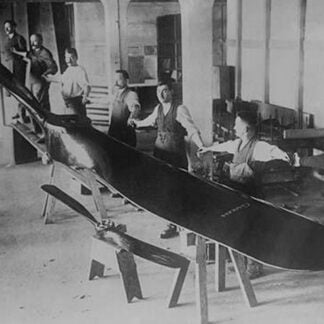 Men Stand along the Huge Propeller in the Sikorsky Workshop on Long Island