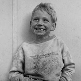 Migrant Child in Shafter camp by Dorothea Lange