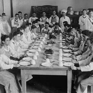 Naval Cadets sit at long table with bowls in front #2