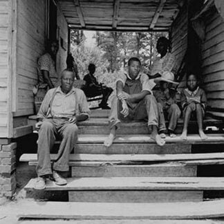 Negro Family Sharecroppers on Porch by Dorothea Lange