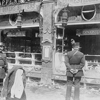 Parisian Police Look at German Shops Ransacked by Mob