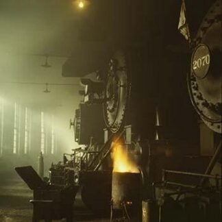 Photo of Fronts of Steam Engine Locomotives on Factory Floor