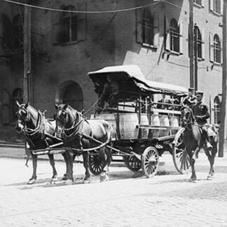 Police On Horseback Guard a Team Driven Wagon during car Strike