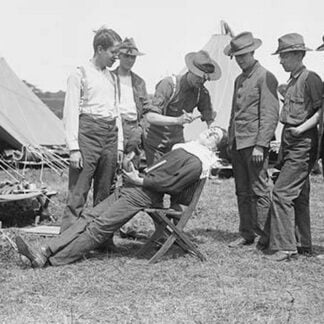 Regimental Barber Shaves the Troops