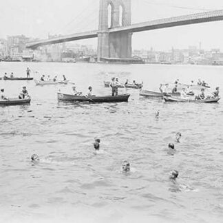 Swimmers Race to Coney Island just past the Brooklyn Bridge