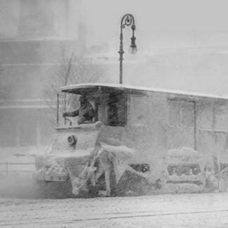 Trolley Snowplow Pushes ahead in heavy snowfall on New York Streets