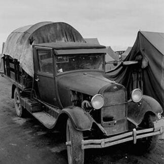 Truck Parked by Tent in FSA site by Dorothea Lange