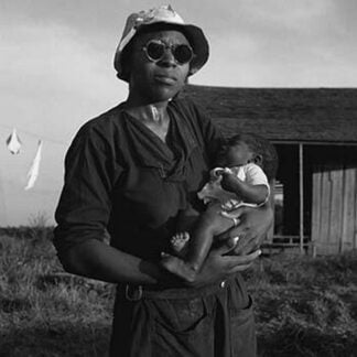 Wife and Child of Tractor Driver by Dorothea Lange